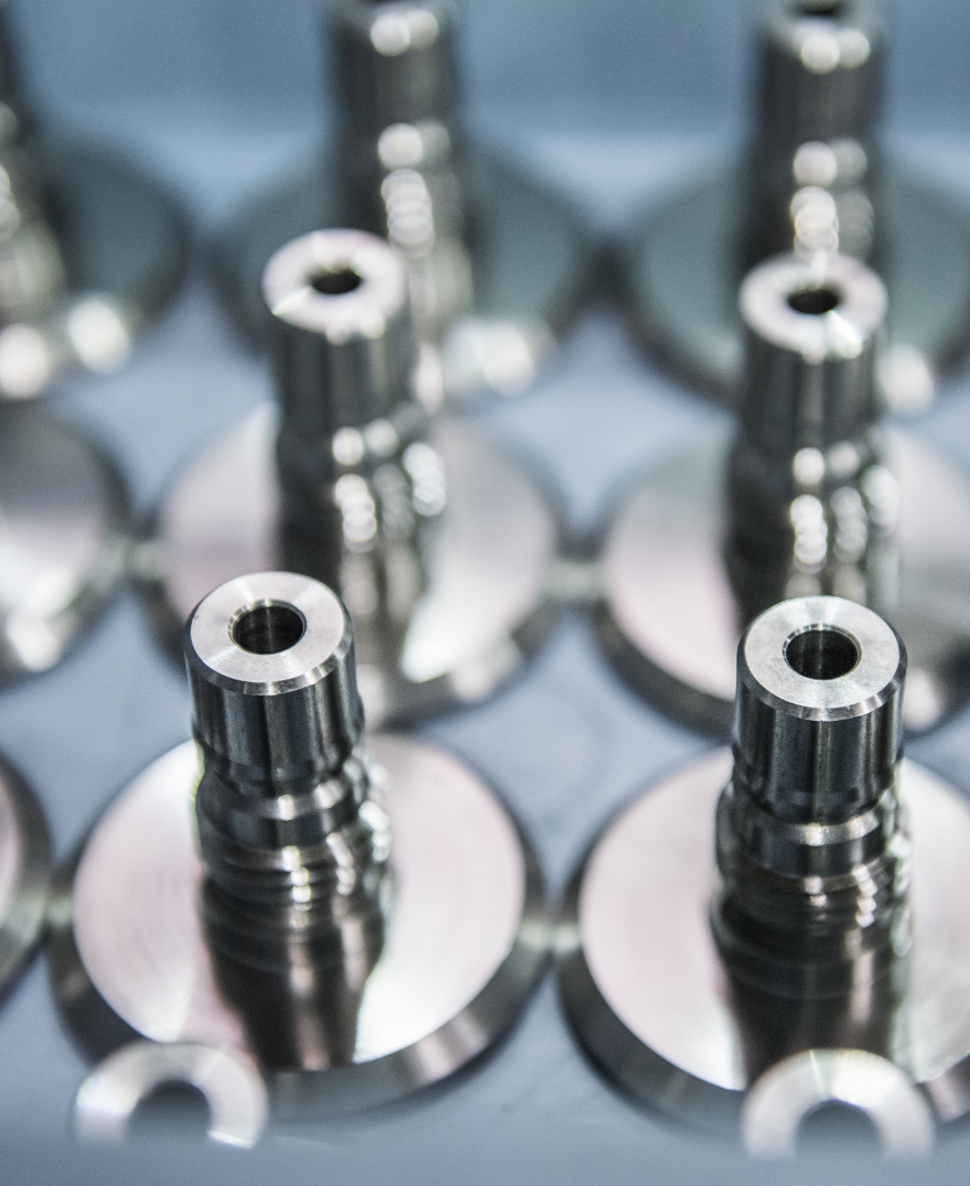 Automation and robotic integration in high-volume CNC production